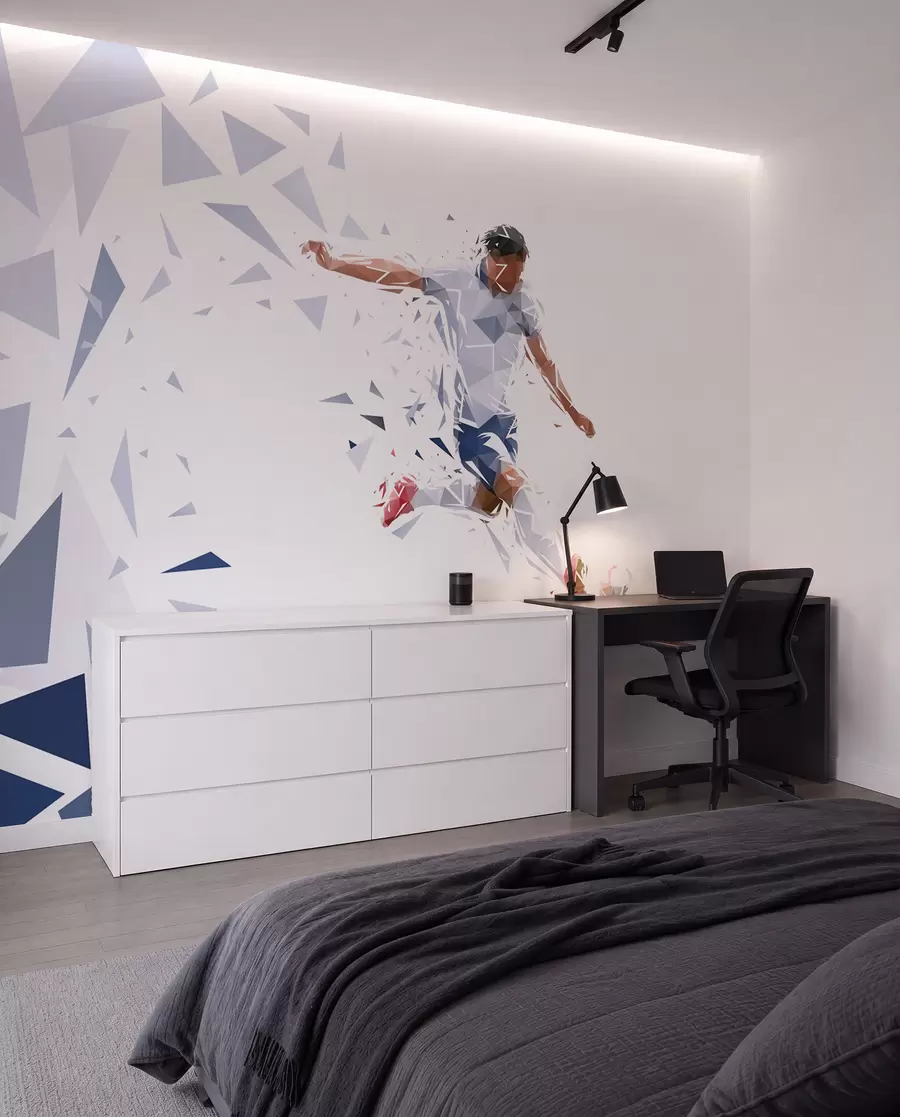 Fototapet Dynamisk fotbollsspelare i low-poly-stil som slår till bollen w03289