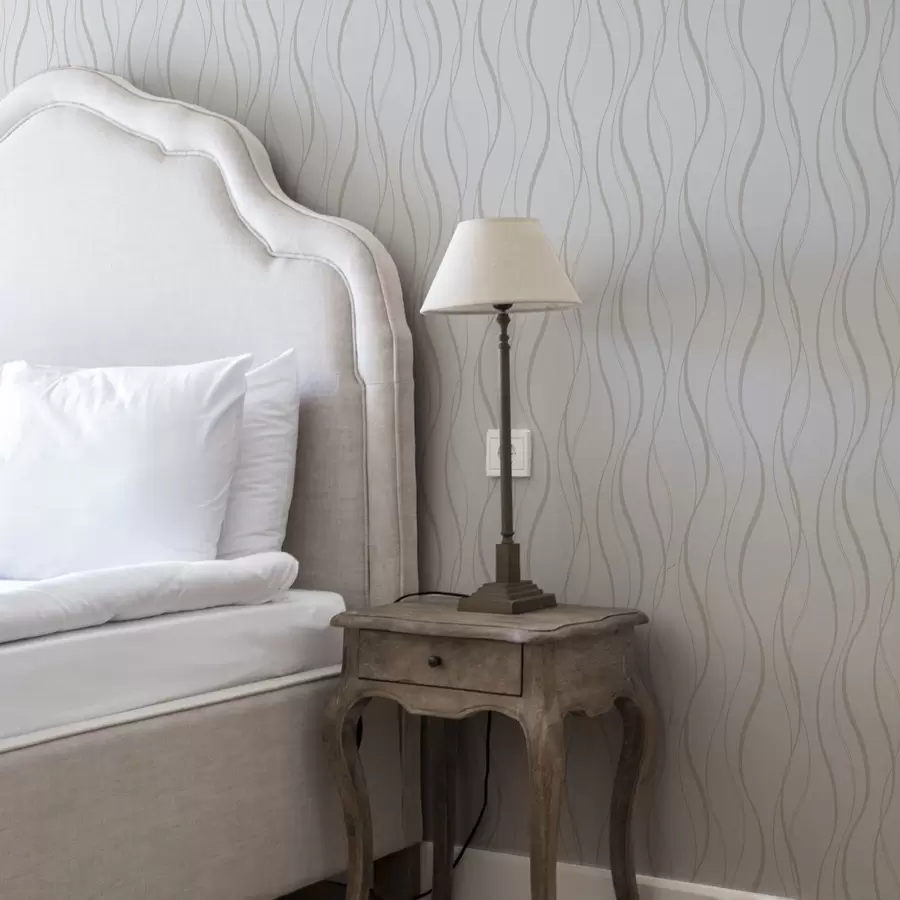 Fototapet Abstrakta vågiga beige linjer på en vit bakgrund a00480